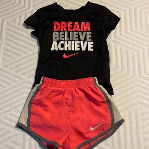 Black shirt 3T and pink shorts 3T